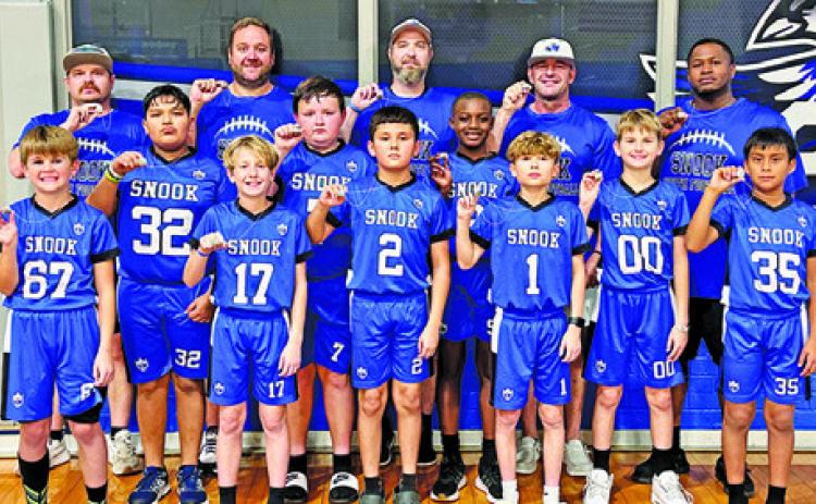 THE SNOOK DIVISION 3 flag football team recently won the 2025 Division 3 championship by defeating Somerville 13-12 in the title game. The championship team includes, from left, front, Zachary Giesenschlag, Gus Giesenschlag, Adan Rico, DJ Cotton, Grayson Giesenschlag, Noe Sierra, middle, Jose Vasquez, Jase Hruska, Cornell Curry, back, Coach Derek Cotton, Coach RJ Giesenschlag, Coach Wade Giesenschlag, Coach Justin Hruska and Coach Cornell Corry.