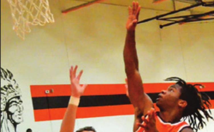 SOMERVILLE’S HERSCHEL Conway takes a shot last Friday against Milano. The Yeguas won 53-52. -- Tribune photo by Roy Sanders