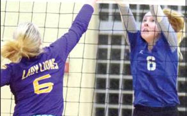 JAYCIE BRISCO BLOCKS a hit from Granger’s Carsyn Locklin-Bilbrey during Snook’s bi-district loss on Tuesday in Rockdale.
