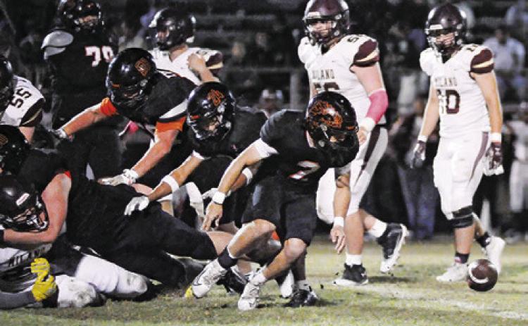 THE BALL IS FREE for Somerville defenders in the Milano game. Pictured are Colt Holton, Kaleb Leang and Martin Espinoza. Tribune photo by Denise Squier