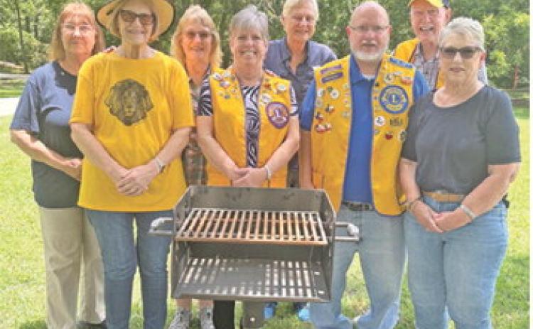 THE CALDWELL BURLESON COUNTY Lions Club donated 10 charcoal grills made by the Caldwell High School Ag shop welding class to the Harry Hejl City Park. Making the presentation are Lions, Scarlette, Pat, Cindy, Jacque, Robin, Ken, Bob and Kathy. Photo courtesy of Lion Adrien Drouilhet