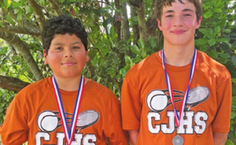 KEVIN MARTINEZ and Brenden Lee placed in boys’ doubles in the eighth-grade competition at the district tennis tournament.