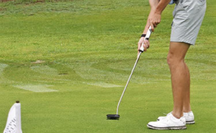 BRETT WITHEM of Snook works on putting.