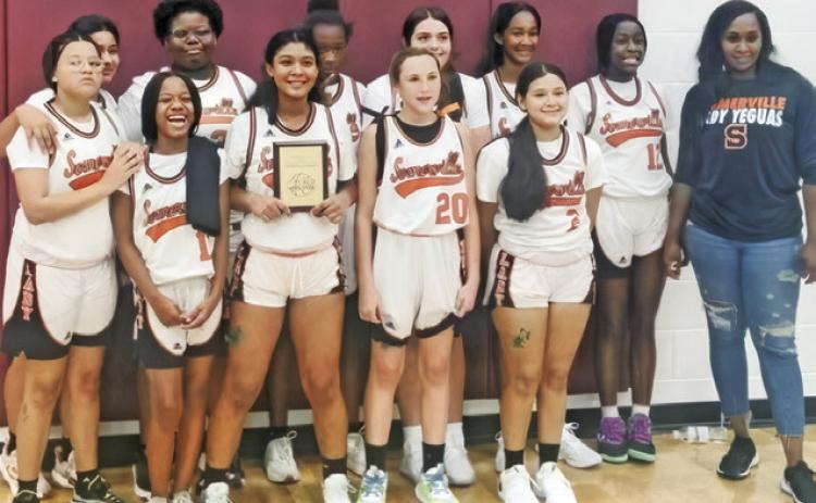 THE SOMERVILLE LADY YEGUA Junior High School basketball team won the Hearne Eagle Junior High Tournament championship by beating Mumford in the title game 32-17.