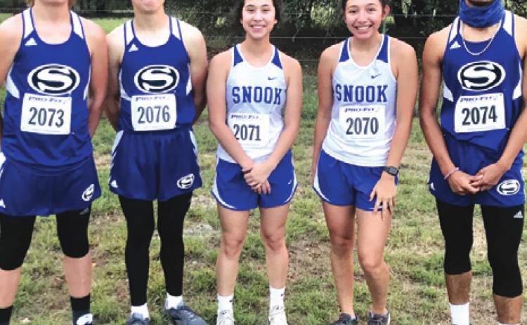 THE SNOOK CROSS COUNTRY team competed at the Salado Tenroc High School Invitational last week at Tenroc Ranch. The team includes boy runners, John See, Jared Bryan and Jose Garcia, and girl runners, Carmen Miller and Paola Arredondo.