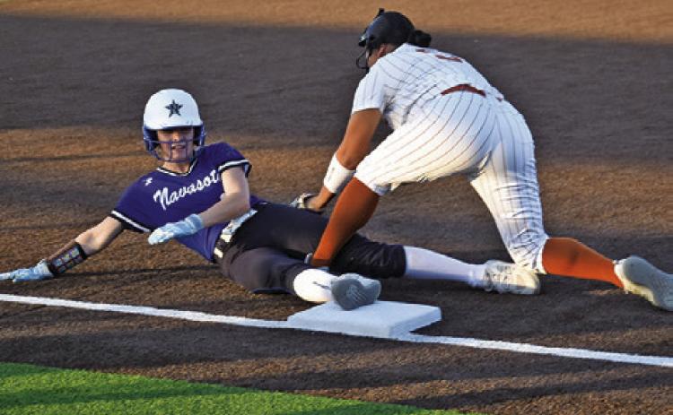 CALDWELL’S HAILEY REYES attempts to tag out a Navasota runner during the Lady Hornets’ win over the Lady Rattlers. Tribune photo by Roy Sanders