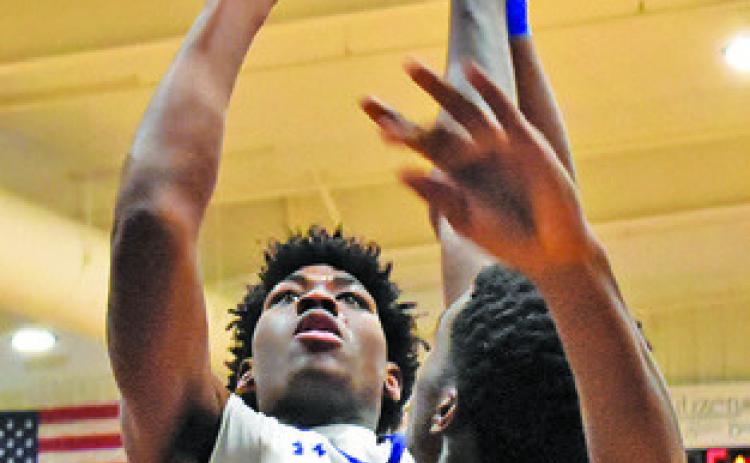 KE’TREEN CARTER of Snook takes a shot in last week’s loss to Mumford.