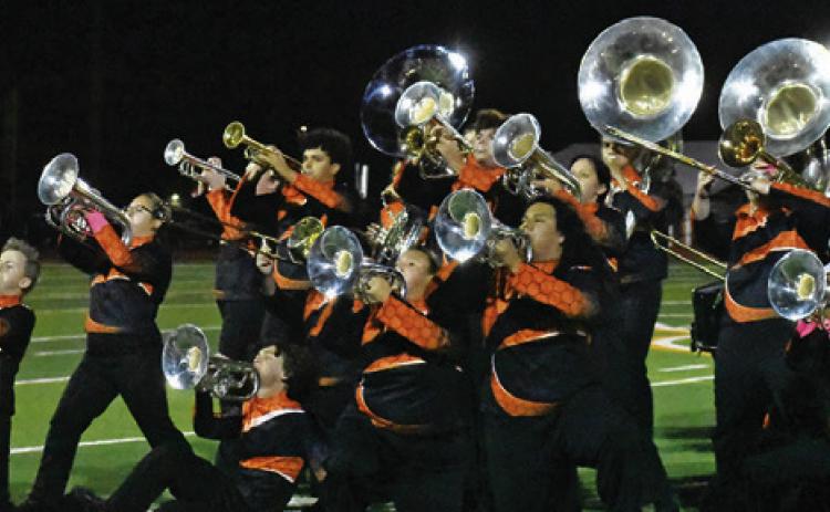 THE CALDWELL HIGH School Band performs at halftime