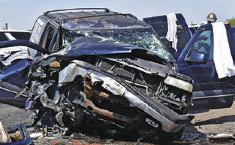 THIS VEHICLE was destroyed on Friday afternoon, Sept. 25, in an accident on State Highway 21 West. No information on the crash was available at press time. Tribune photo by Roy Sanders