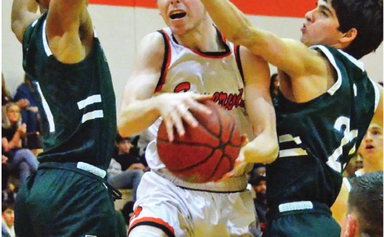 GARRISON BALLARD GETS ready to take a shot last Friday against Normangee. Somerville kept it close through three quarters but the Panthers won 61-42. -- Tribune photo by Roy Sanders