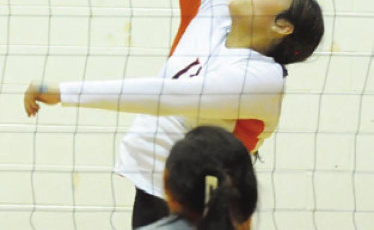 GRACEE GRIFFENSTEIN gets one of her seven kills against Hempstead last Friday night during the Somerville-Hempstead match. Tribune photo by Denise Squier