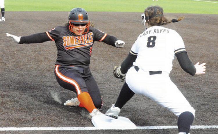 SOMERVILLE’S WENDY PEREZ slides into third base during the Lady Yeguas’ game against Giddings at the Thrall Softball Tournament last week.