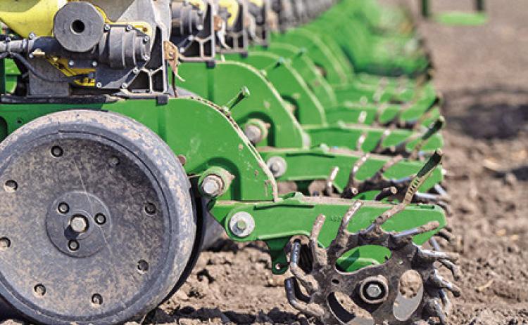 TILLERS APPLY fertilizer in a farm field as rising input costs driven by global markets and energy prices put pressure on agricultural producers. Photo courtesy of Michael Miller/ Texas A&amp;M AgriLife