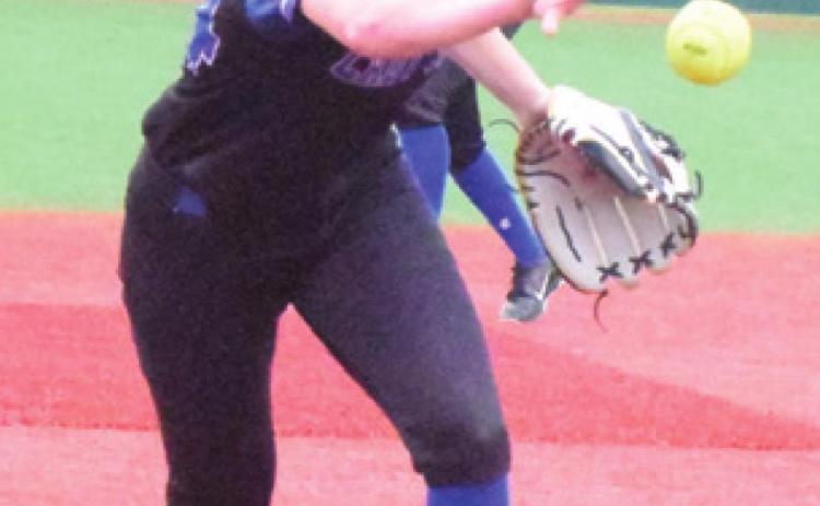JAYCIE BRISCO tosses the ball to third baseman Leighla Strong during the Snook-Centerville bi-district game last Friday.