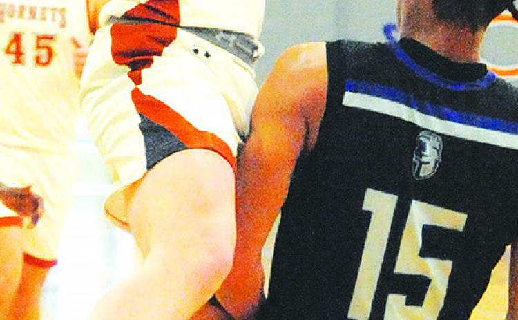 CALDWELL’S NATHAN Scott hurls this pass against Manor New Tech on Saturday.