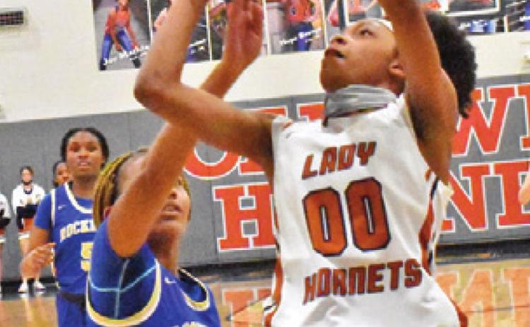 CALDWELL’S JA’ASIA Mathis shoots during Caldwell’s home win over Rockdale last Friday night. Mathis scored 30 points in the victory.