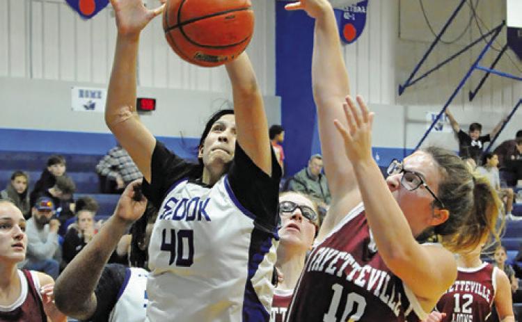 SNOOK’S KARLA LARA pulls down a rebound during the Lady Jays’42-31 win over Fayetteville last Tuesday night in Snook.
