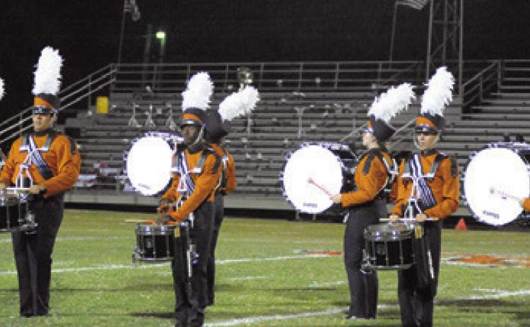 CALDWELL HIGH SCHOOL’S marching band performs at halftime of the Caldwell-Gonzales football game in Gonzales.
