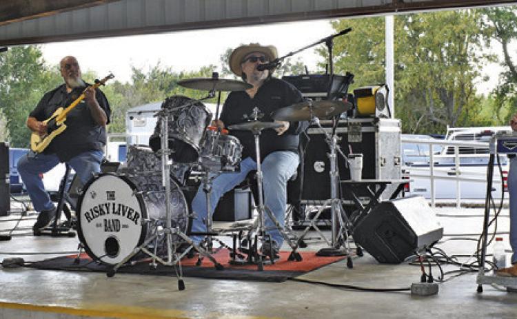 THE RISKY LIVER BAND performs on Saturday at Snook Fest at Snook City Park. Tribune photo by Roy Sanders