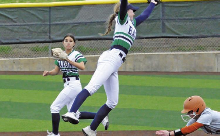 CALDWELL’S BREAN SIMS dives to slide into second base as a (Fort Worth) Eaton player is pulled off the bag by a throw during a tournament game at Lady Hornet Field. -- Tribune photo by Denise Squier