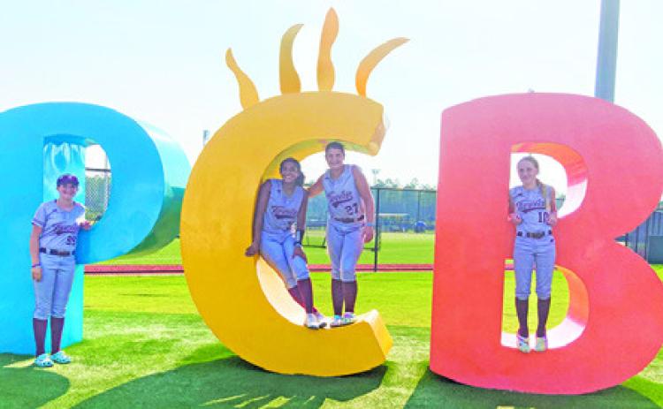 BURLESON COUNTY SOFTBALL players, Kylie Neuendorff, Emma Williams, Emma Loehr and Aubrey Flencher, recently played in the United States Fastpitch Association World Series in Panama City Beach, Florida, with the Texas Twelve 14U from College Station.