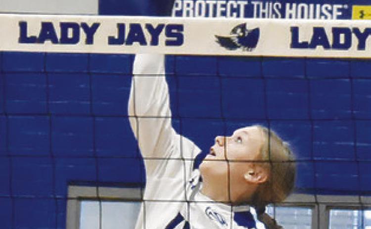 DAKOTA KIENOW gets a kill during the Snook-North Zulch match on Friday. Tribune photo by Roy Sanders
