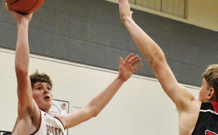 NATHAN SCOTT GETS this shot off despite some pressure from the defense against Salado. -- Tribune photo by Roy Sanders