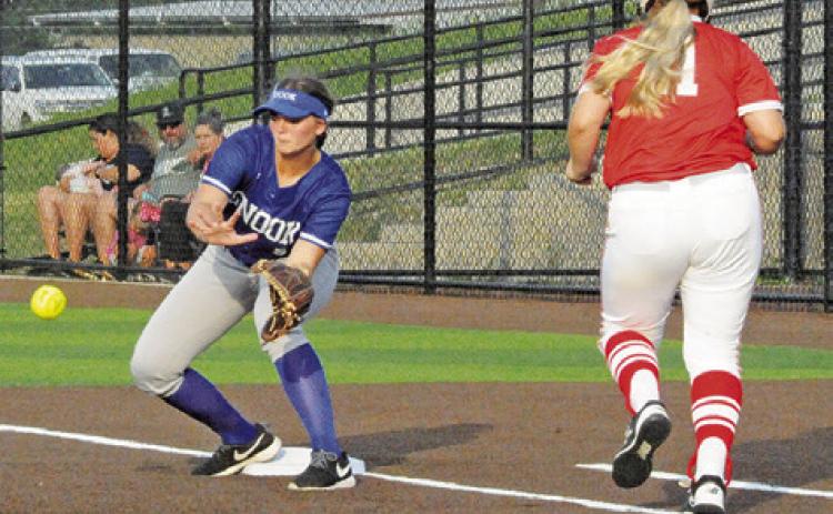 SNOOK’S ALEXIS MACIK PREPARES to catch the ball at first base during Thursday’s area game against Bremond. -- Tribune photo by Denise Squier