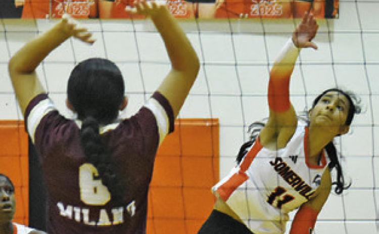 ANETTE REYNA gets a kill against Milano last Friday in the Lady Yeguas’ win. Tribune photo by Roy Sanders