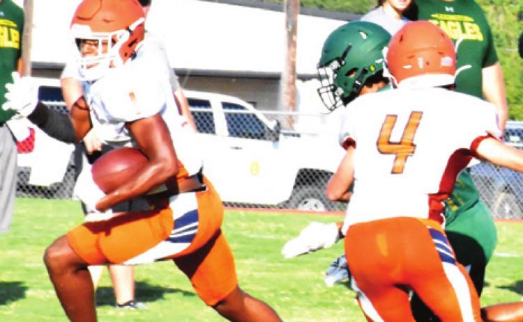 CALDWELL’S JAMAR HEWITT breaks free against Lexington.