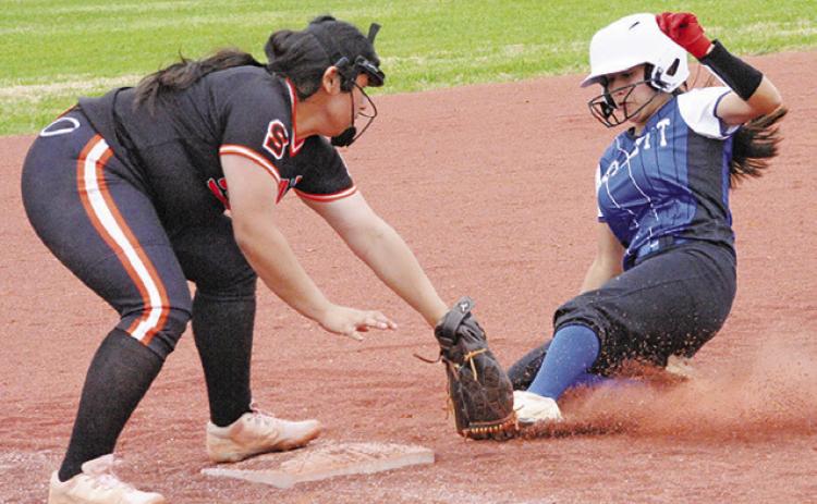 SOMERVILLE’S KAELYN CHAVEZ REACHES out to attempt to tag out a Bartlett runner at third base during the Lady Yegua Softball Tournament last week. -- Tribune photo by Denise Squier