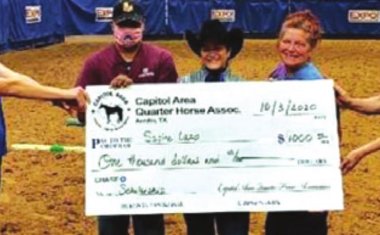 SABINE LAZO was recently awarded the Don Blazer Memorial Scholarship by the Capitol Area Quarter Horse Association. Pictured are Jessica Twohig, Sal Lazo, Lazo, Kelly Lazo and Janine Hess.