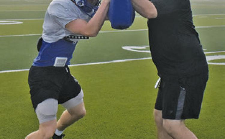 SNOOK PLAYERS work on fundamentals during practice getting ready for their Friday, Aug. 28 opener against Hull-Daisetta.